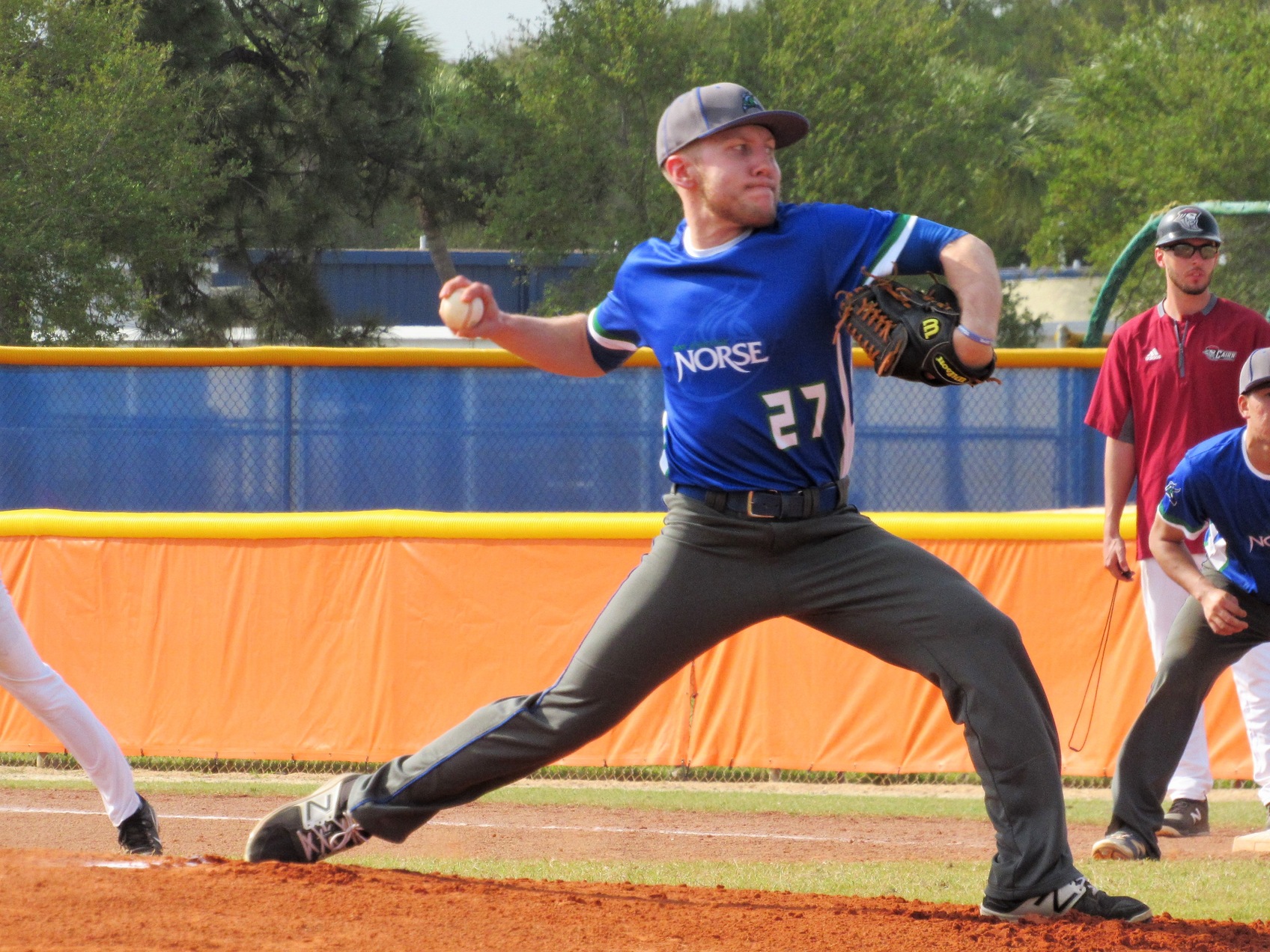 Tyler Skufca mid stride pitching 