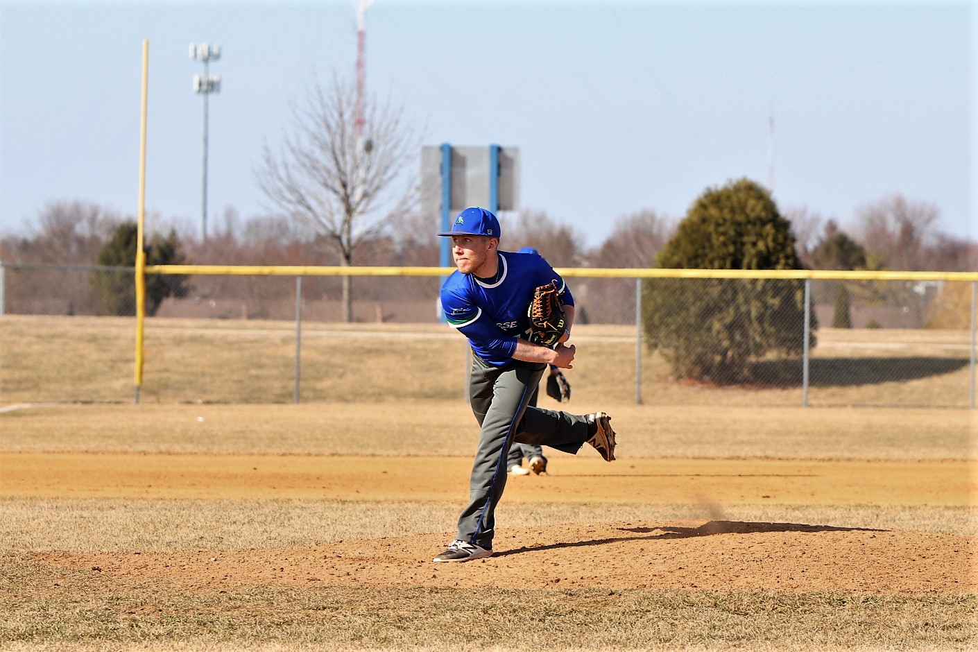 Tyler Skufca on the mound, having just released a pitch