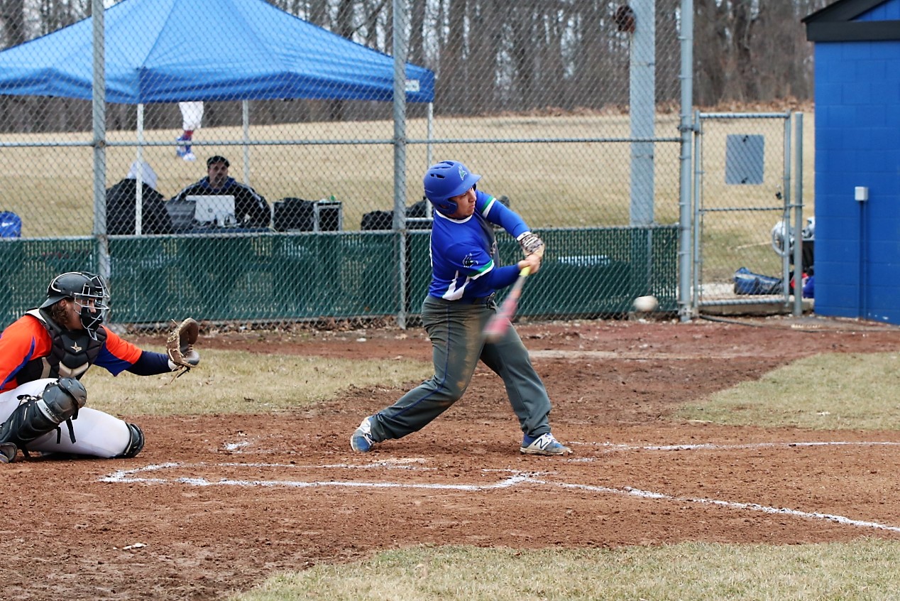 Owen Hanson swinging at a pitch