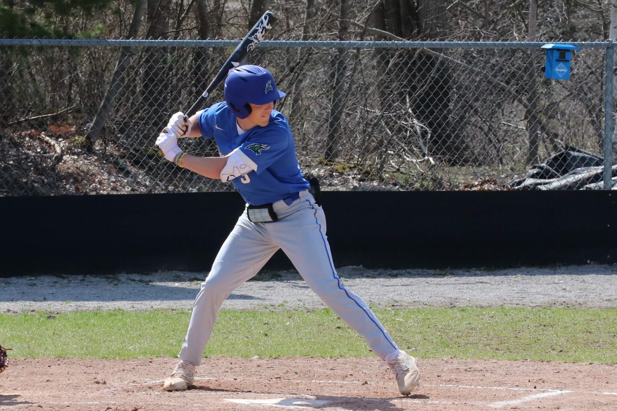Tyler Darmogray strides out as a pitch comes in