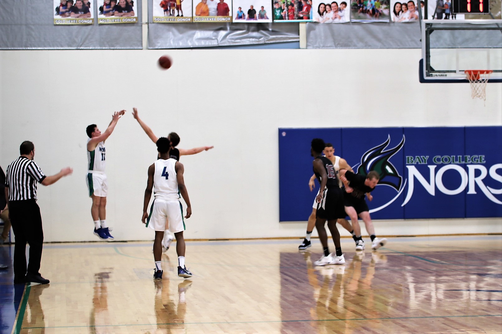 Ryan Arnt shooting a three from the corner
