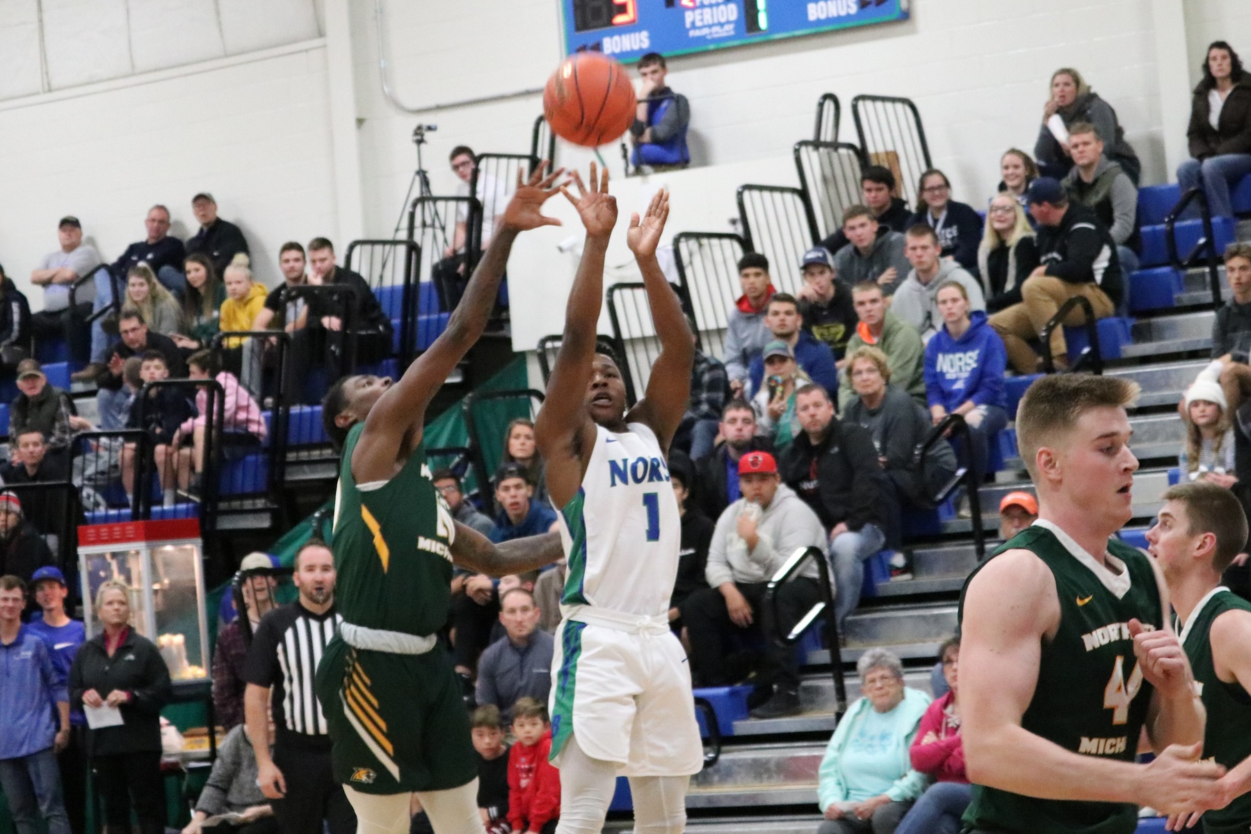 Khalid Fleming shooting a three-pointer