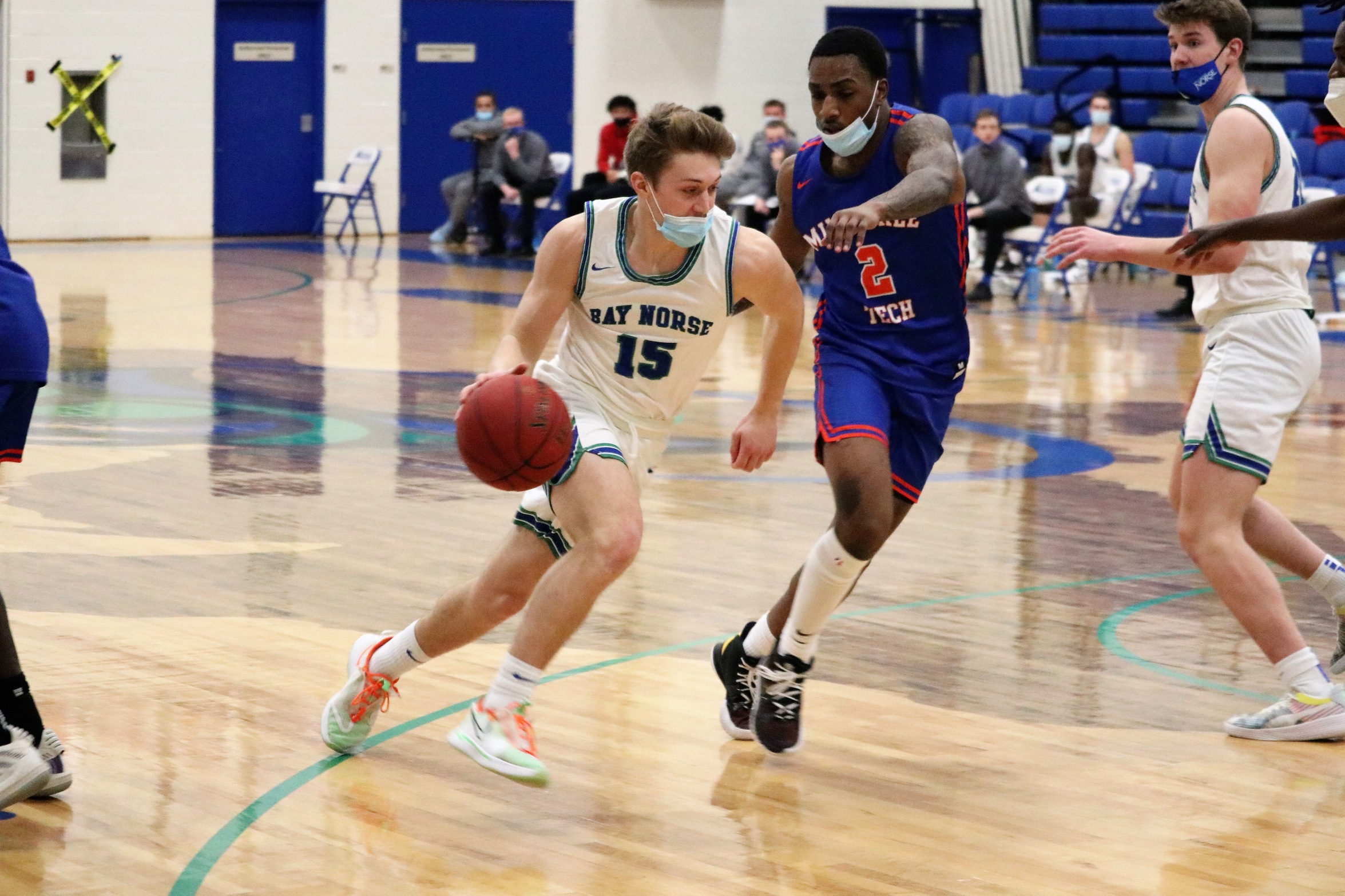 Tyler Sundling dribbles past a defender