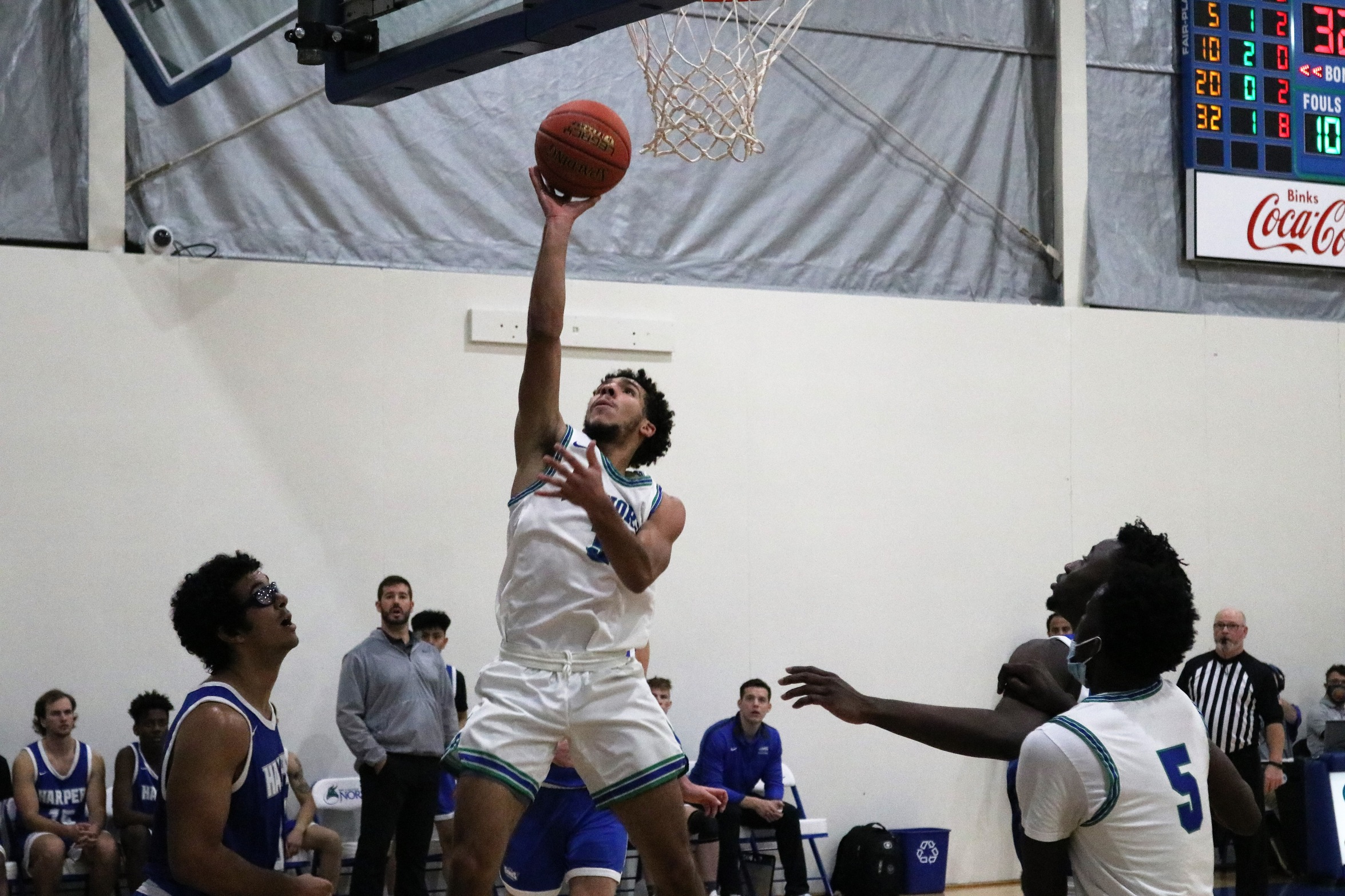 Tre Burris about to release a layup