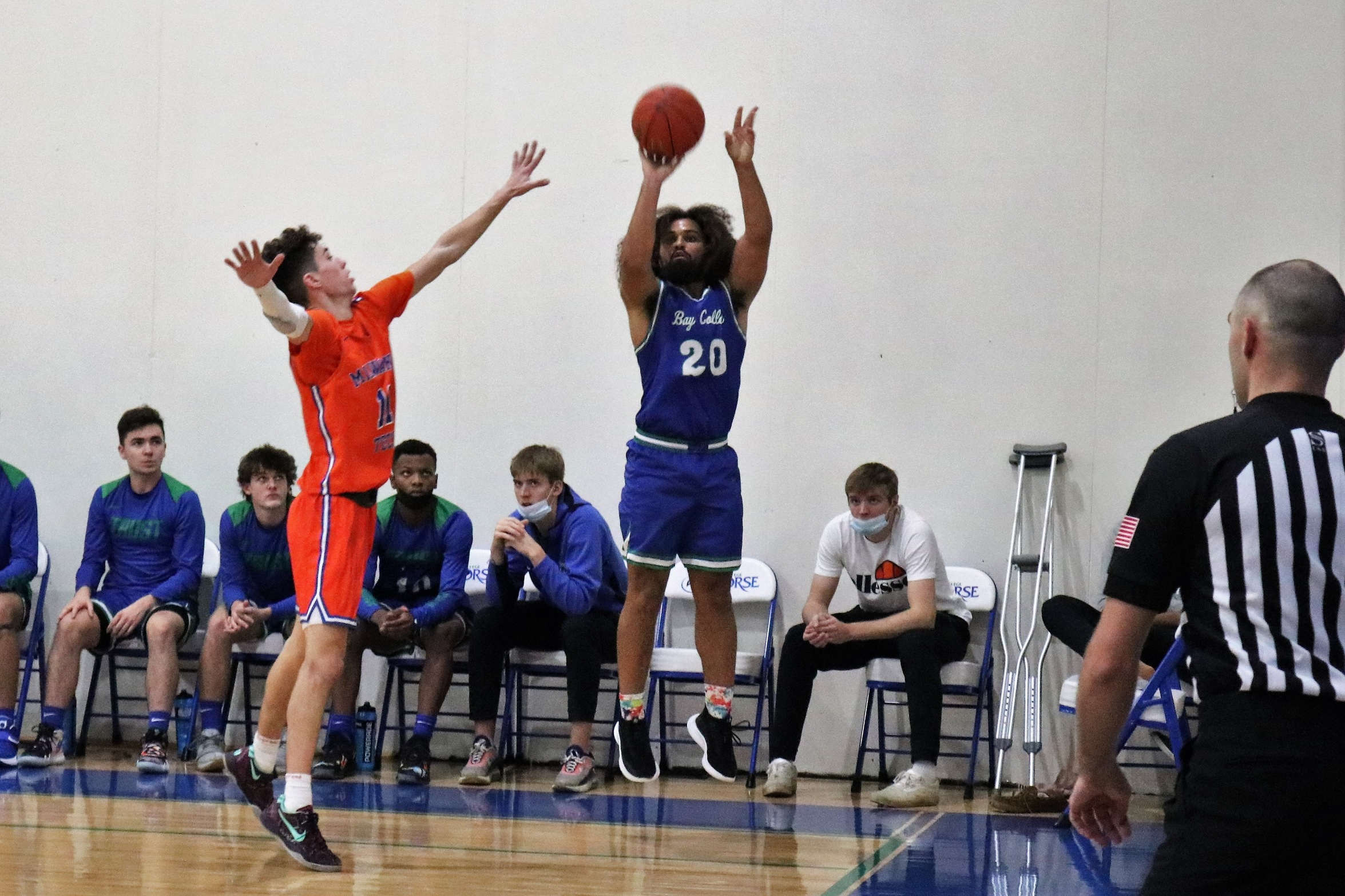 Marcus Harris releasing a three from the corner