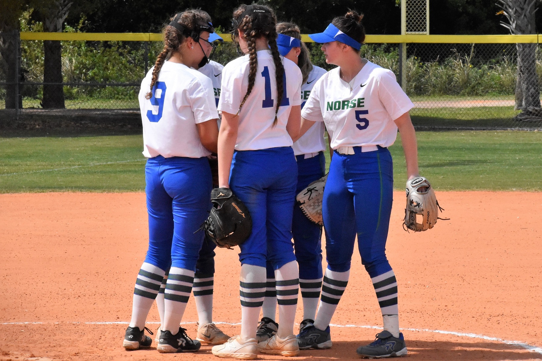 Bay players gathering at the mound in between innings