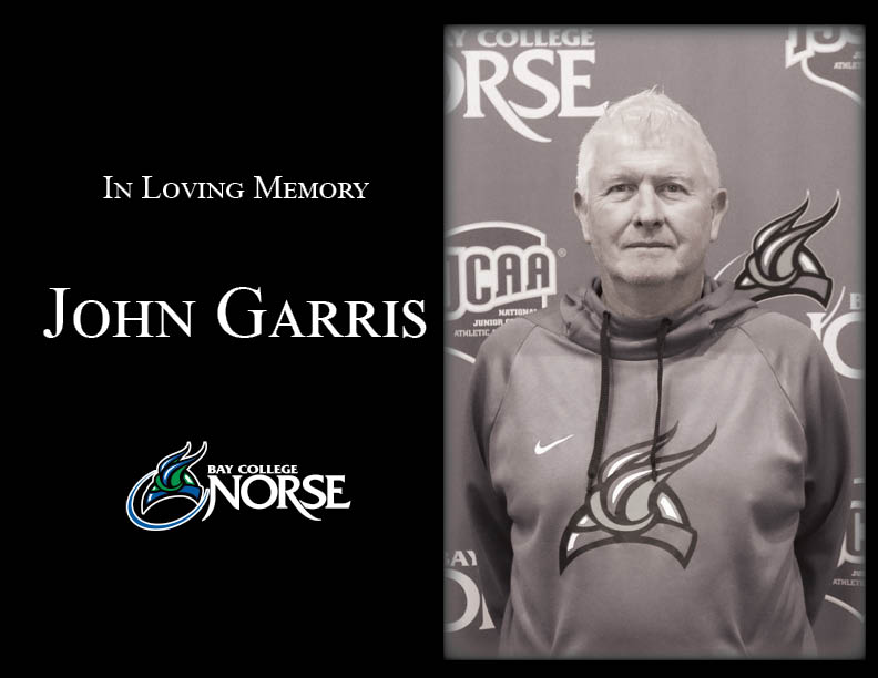 A black and white picture of John Garris, with the words 