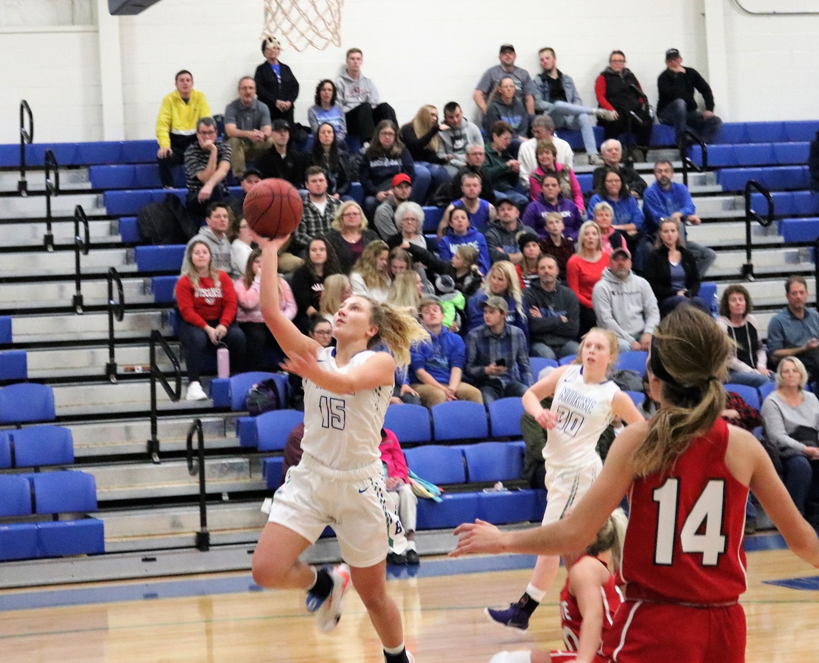 Haley Trudell shoots a layup