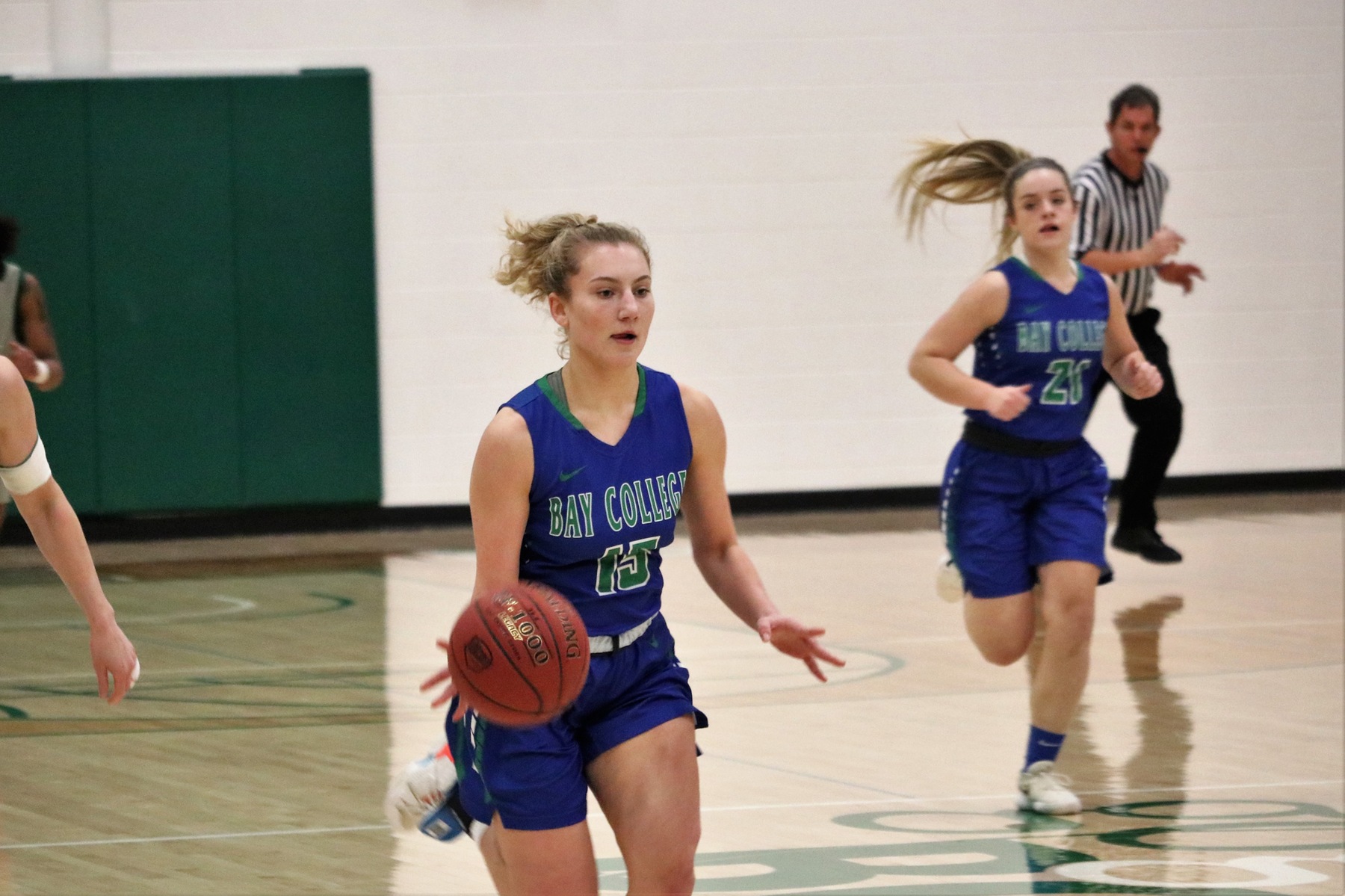 Holly Wardynski dribbling up the floor