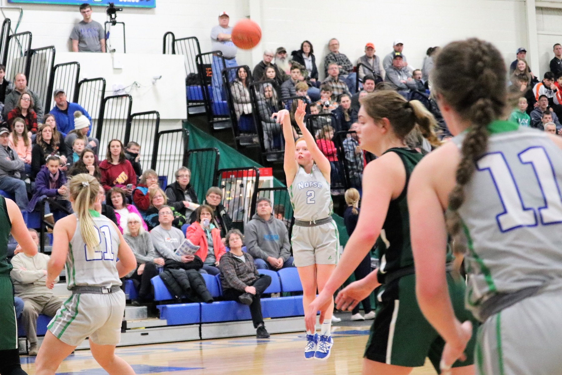 JuliAnn Wickman Shooting a three-pointer