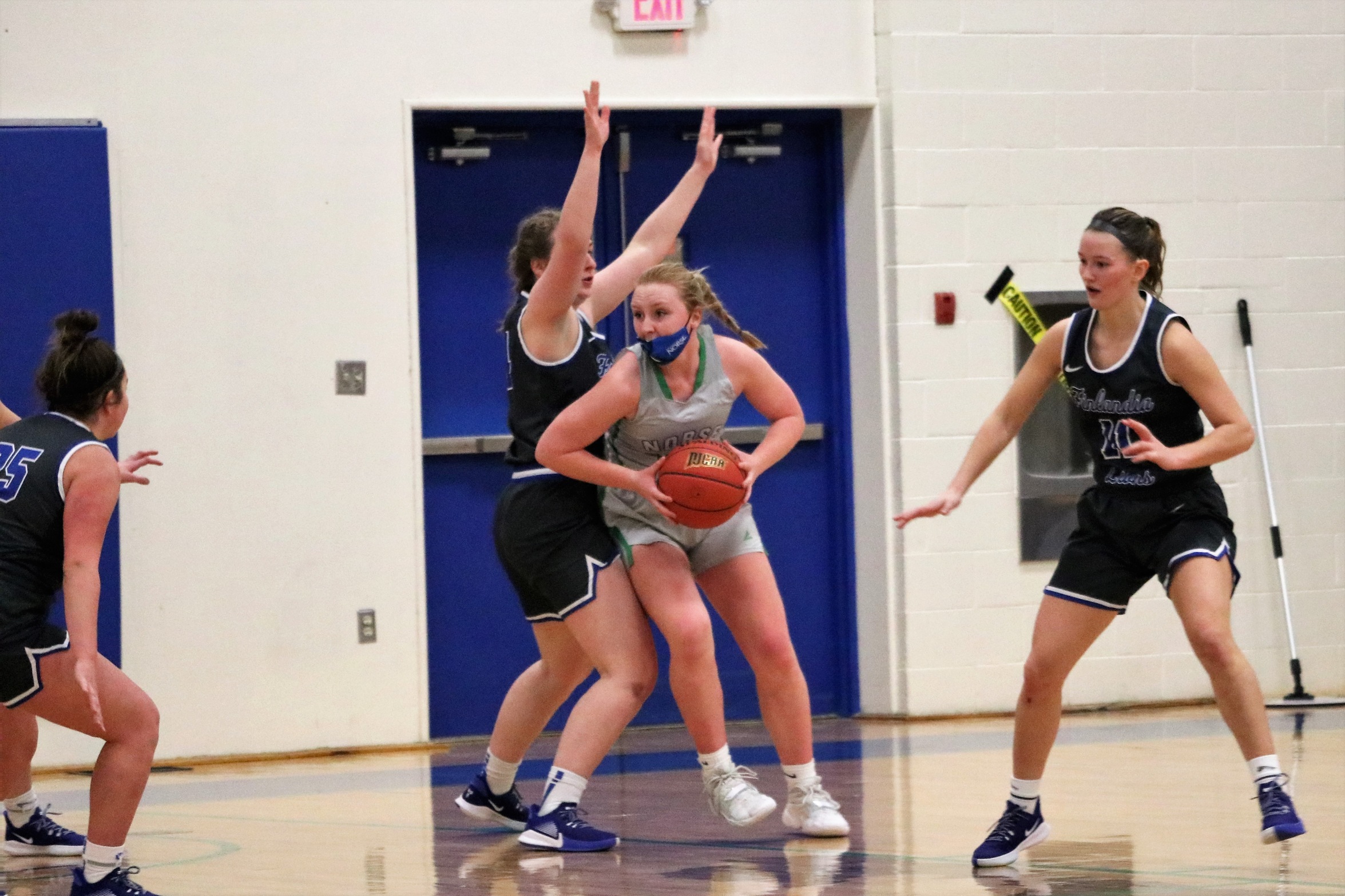 Sandra Boulton making a move in the post off of a defender