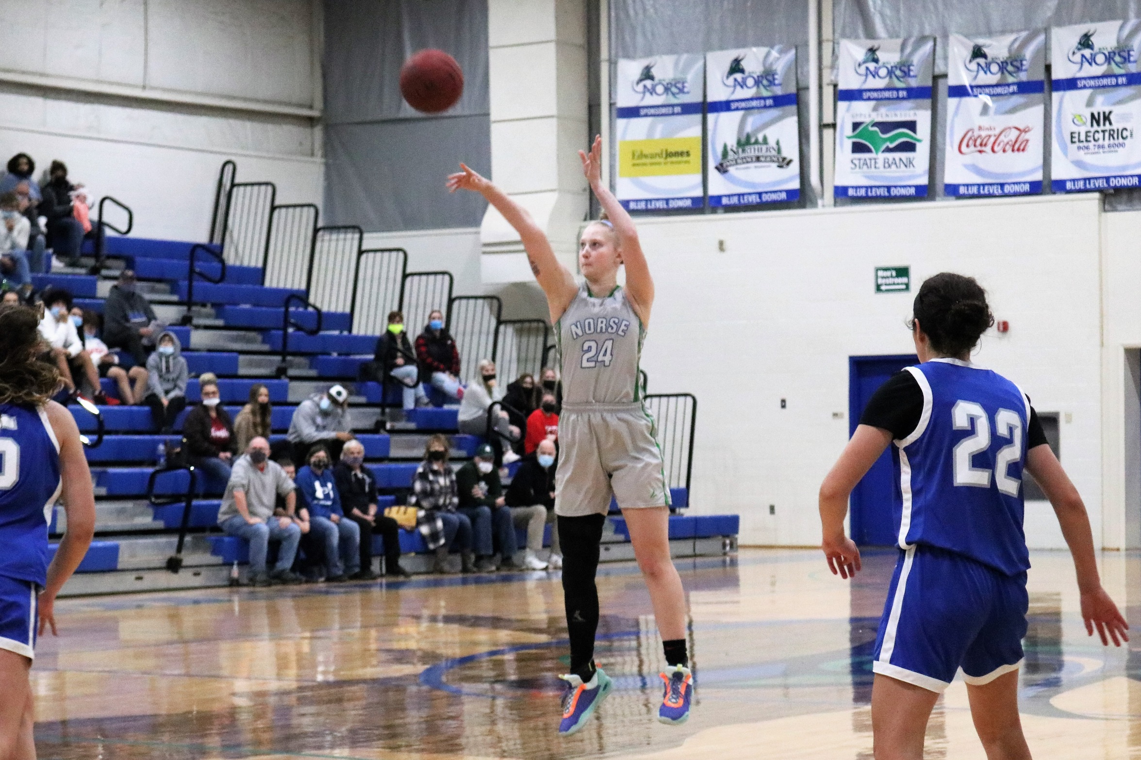 Madison Olsen releases a three from the top of the key