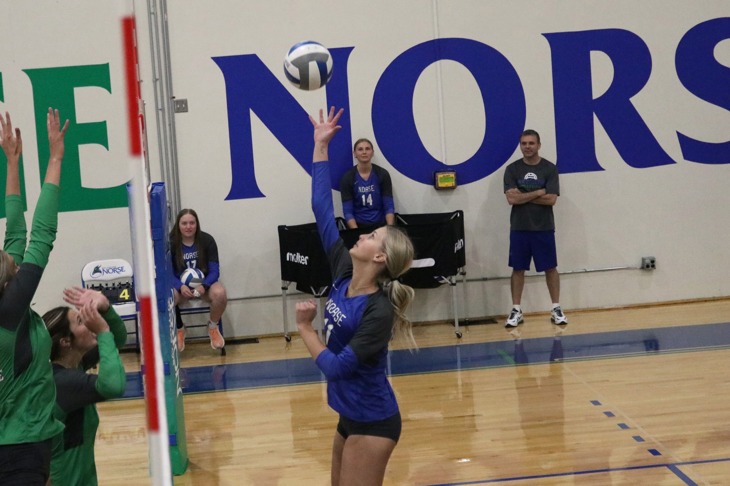 Olyvia Saxton goes up for a kill attempt