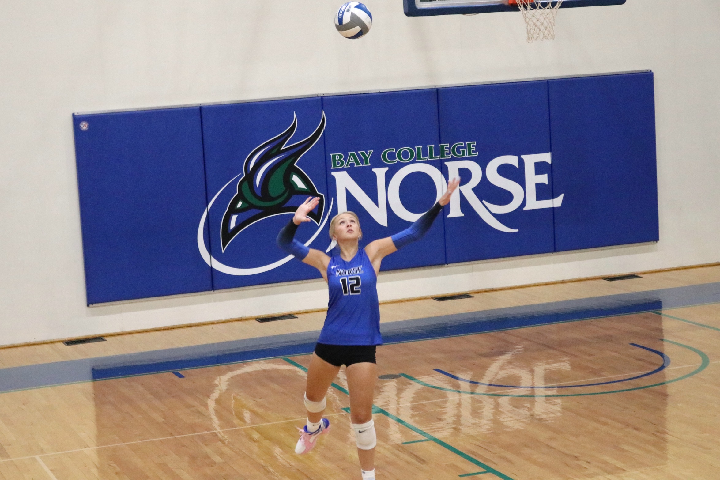 Aubrey Franz leaps in a serve attempt
