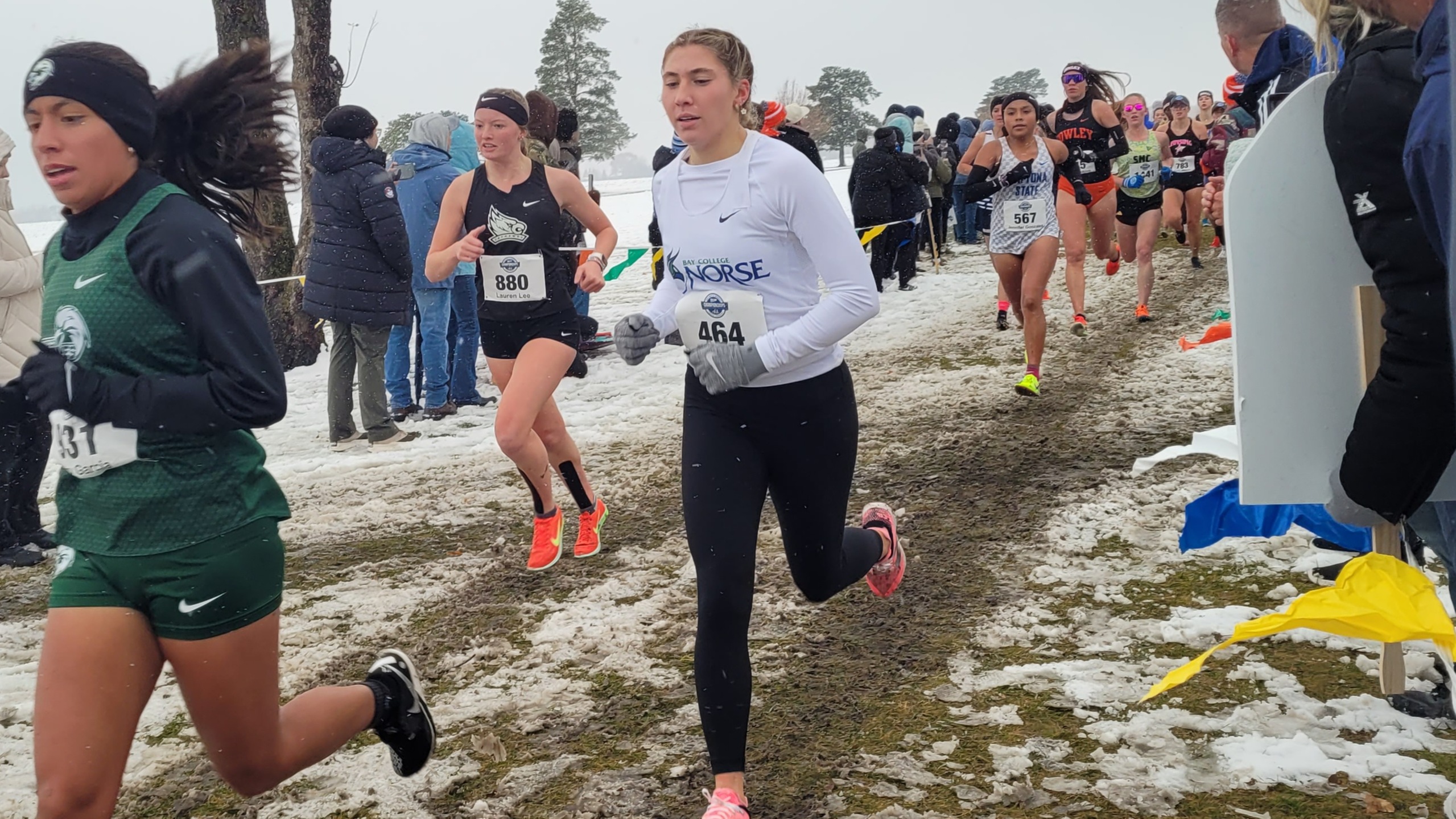 Lily Ross navigates her way through competitors, and snowy, icy conditions
