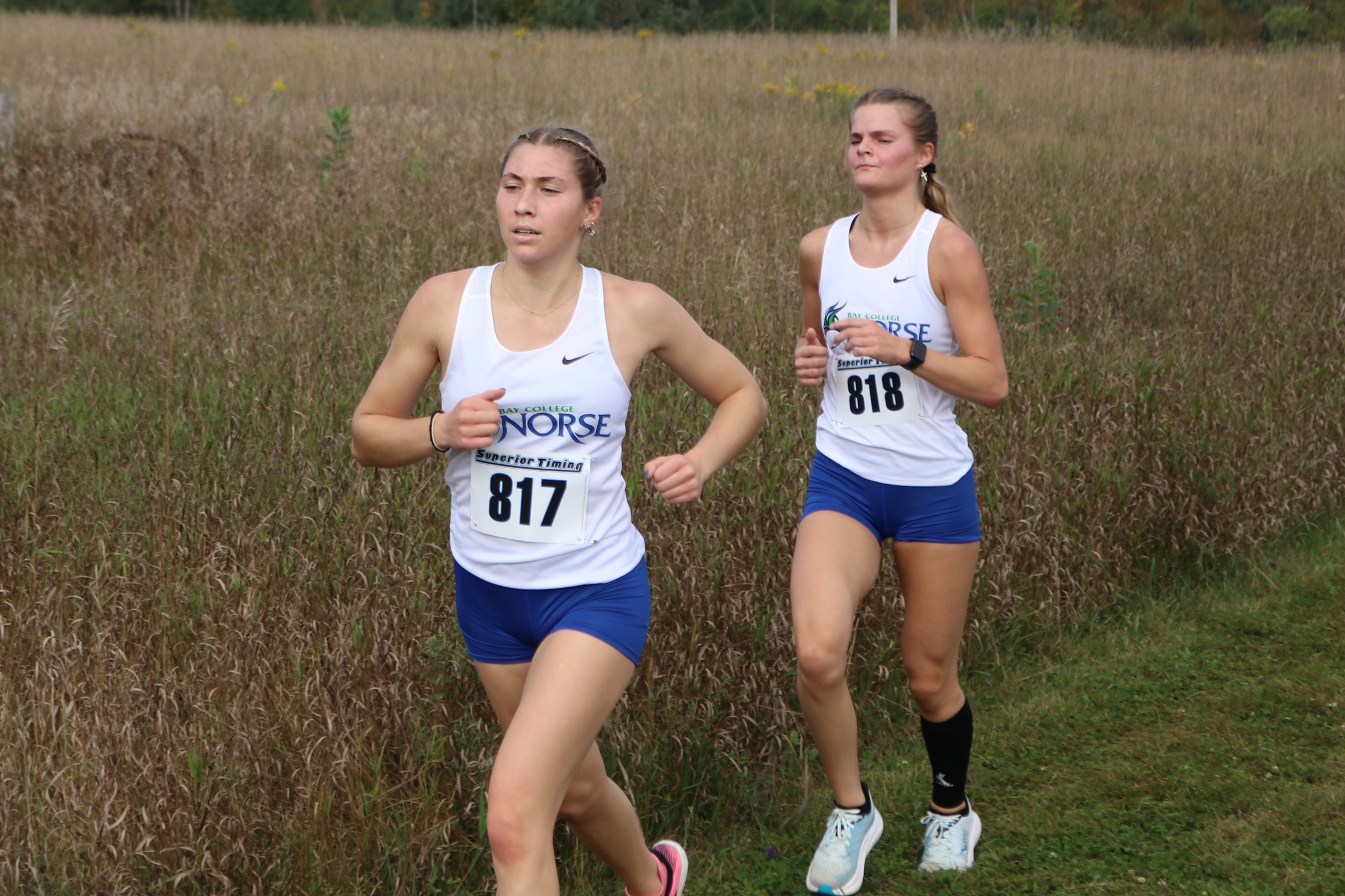 Lilly Ross and Alyssa Shirkey pacing each other in an event earlier this year